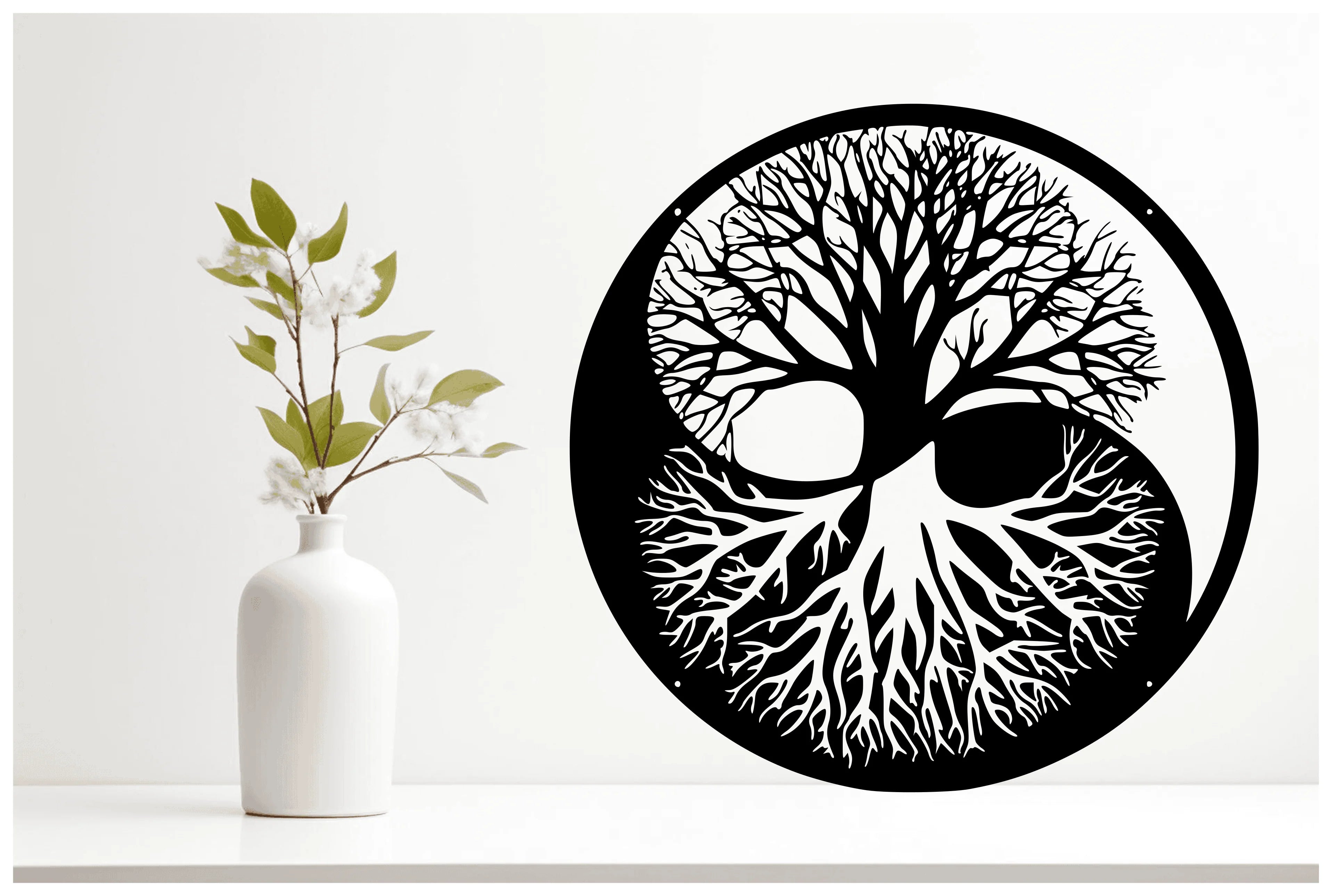 Tree of Life metal wall art featuring intricate branches and roots in a circular design, displayed on a white rendered wall beside a minimalist white vase with green leaves, creating a modern and serene aesthetic