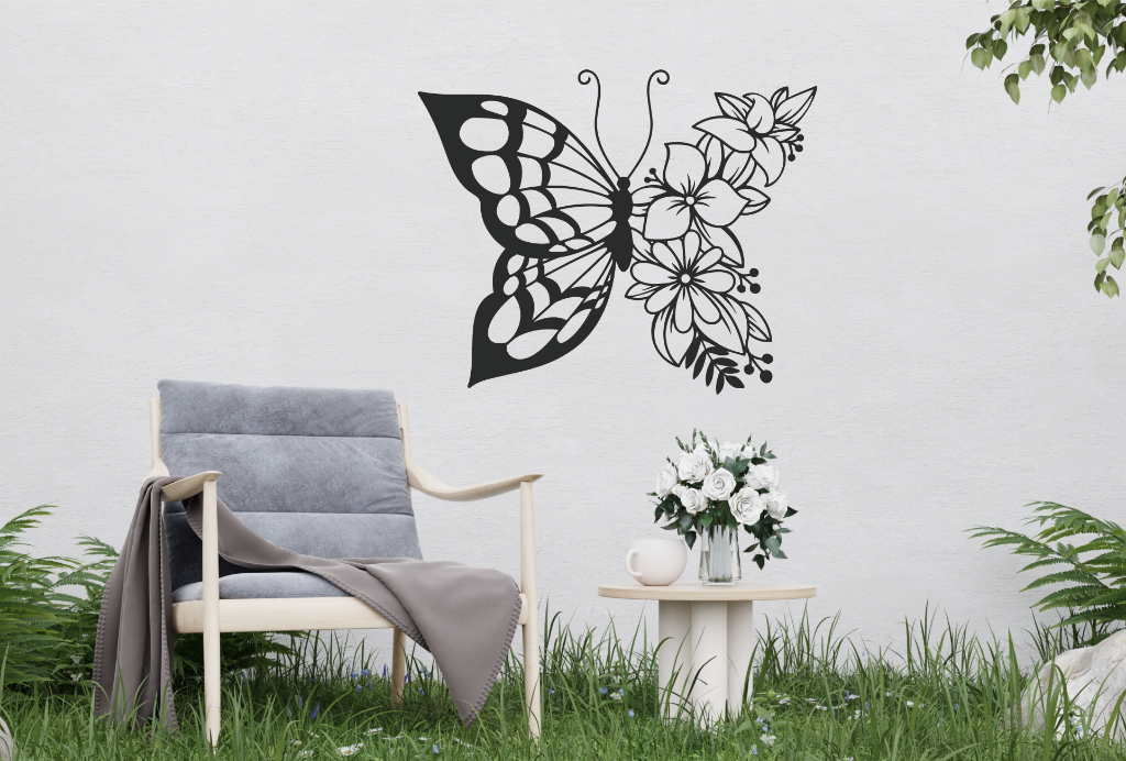 Metal wall art featuring a butterfly design with one wing made of floral patterns, finished in Night Sky Matt Black powder coating, mounted on an outdoor wall, adding a whimsical and nature-inspired touch to a cozy garden seating area