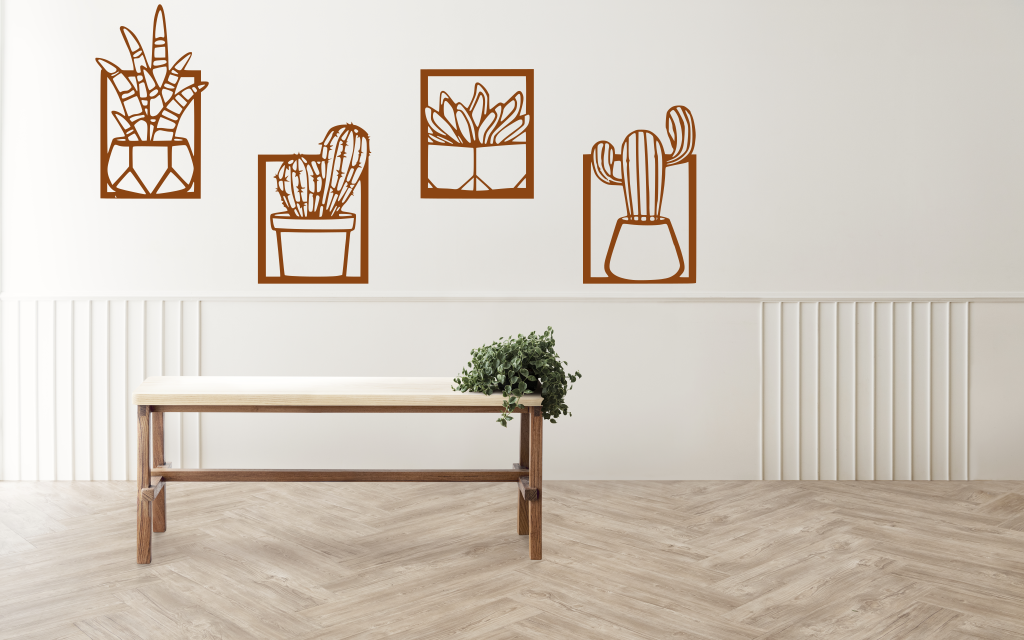 Metal wall art set featuring four distinct cactus designs in minimalist frames, finished in Rust Patina powder coating, creating a modern, playful touch to a neutral-toned interior space with a light wooden bench and soft lighting.