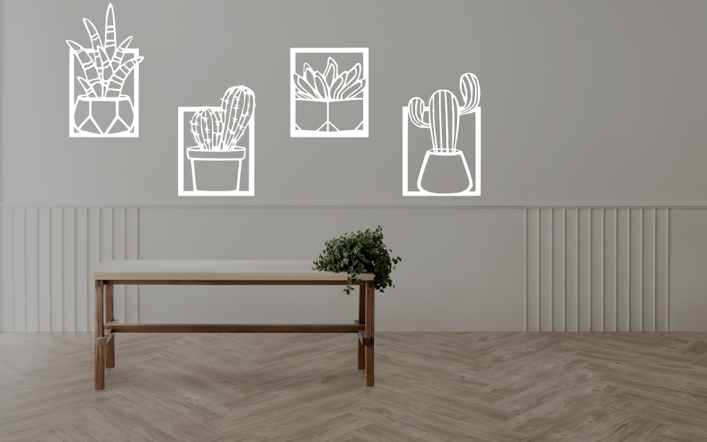 Metal wall art set featuring four distinct cactus designs in minimalist frames, finished in Bright White Gloss powder coating, creating a modern, playful touch to a neutral-toned interior space with a light wooden bench and soft lighting.