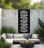 Palm Cascade privacy screen in Night Sky Matt Black, featuring a sleek layered palm leaf design that provides both stylish privacy and a touch of tropical elegance to outdoor spaces.