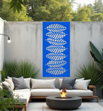 Palm Cascade privacy screen in Blaze Blue Gloss, showcasing a striking blue tone and layered palm leaf pattern, perfect for modern privacy and a splash of color in outdoor settings