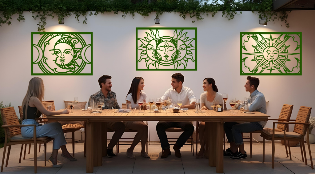 Metal wall art set featuring celestial designs with the sun and moon, finished in Mistletoe powder coating, mounted on an outdoor wall above a dining space, enhancing the ambiance of a social gathering with a mystical and artistic touch.