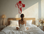 Metal wall art featuring a cross with a silhouette of Jesus wearing a crown of thorns, finished in Manor Red powder coating, mounted on a light wall above a bed, adding a serene and spiritual element to the bedroom.