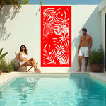 Exotic Eden privacy screen in Signal Red, showcasing a vibrant tropical pattern with bold red tones, ideal for energizing any outdoor space.