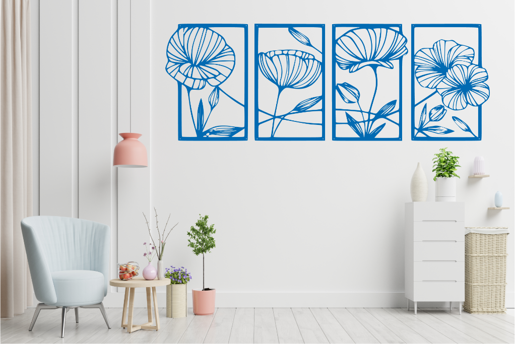 Set of four metal wall art pieces featuring intricate floral designs, finished in Blaze Blue Gloss powder coating. The artwork is displayed on a white wall in a modern living room setting with soft pastel tones and cozy furniture, adding a natural and elegant touch to the space.