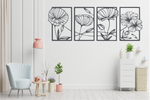 Set of four metal wall art pieces featuring intricate floral designs, finished in Berry Grey Gloss powder coating. The artwork is displayed on a white wall in a modern living room setting with soft pastel tones and cozy furniture, adding a natural and elegant touch to the space.