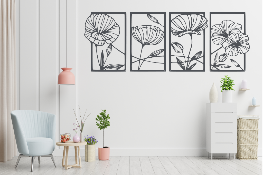 Set of four metal wall art pieces featuring intricate floral designs, finished in Berry Grey Gloss powder coating. The artwork is displayed on a white wall in a modern living room setting with soft pastel tones and cozy furniture, adding a natural and elegant touch to the space.