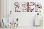 Set of four metal wall art pieces featuring intricate floral designs, finished in Manor Red powder coating. The artwork is displayed on a white wall in a modern living room setting with soft pastel tones and cozy furniture, adding a natural and elegant touch to the space.