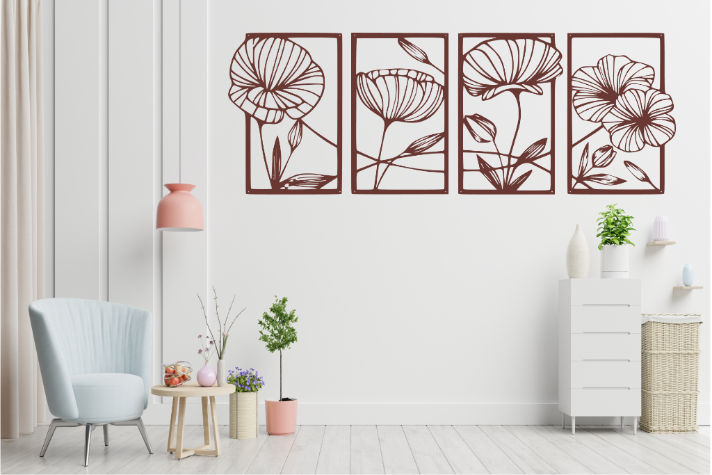 Set of four metal wall art pieces featuring intricate floral designs, finished in Manor Red powder coating. The artwork is displayed on a white wall in a modern living room setting with soft pastel tones and cozy furniture, adding a natural and elegant touch to the space.