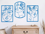 Set of three decorative metal wall art pieces, each featuring an abstract feminine face intertwined with floral elements, finished in Blaze Blue Gloss powder coating. The artwork is displayed on a white wall above a wooden chest of drawers, adding a modern and artistic touch to the room.