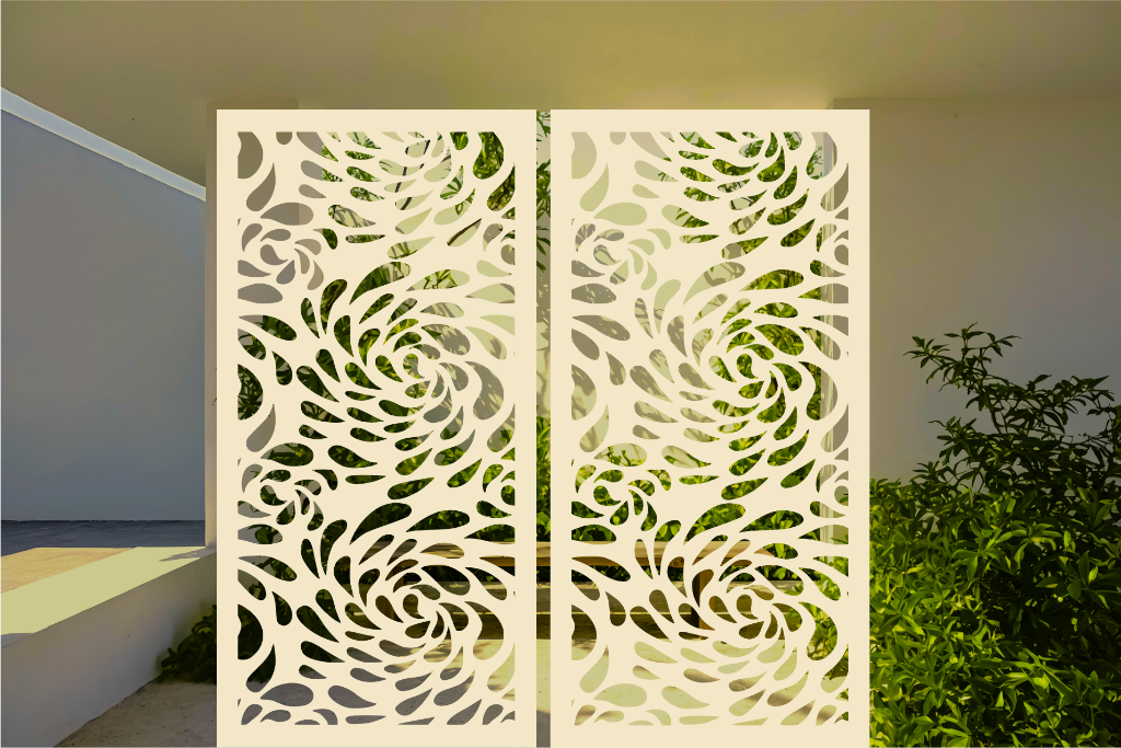 Metal privacy screen featuring a swirling droplet pattern, finished in Canola Cream powder coating. The screen is displayed outdoors with green foliage visible through the cutout design, offering an elegant and organic element to any outdoor space.