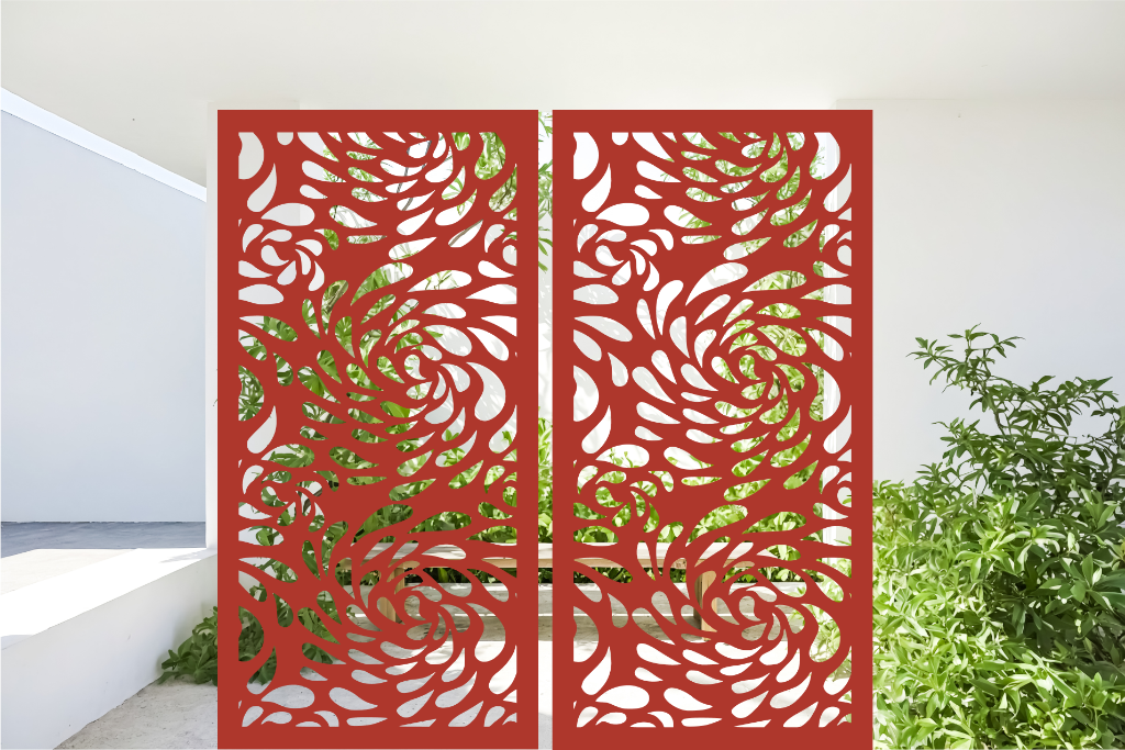 Metal privacy screen featuring a swirling droplet pattern, finished in Signal Red powder coating. The screen is displayed outdoors with green foliage visible through the cutout design, offering an elegant and organic element to any outdoor space.