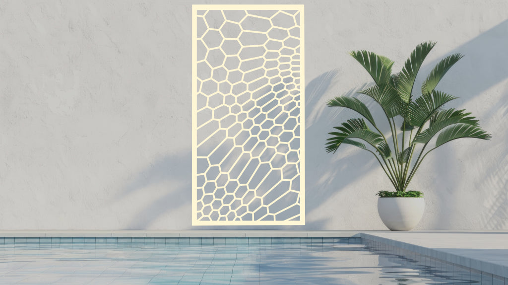 Honeycomb-pattern privacy panel in Canola Cream, bringing warmth and charm to poolside or garden spaces.