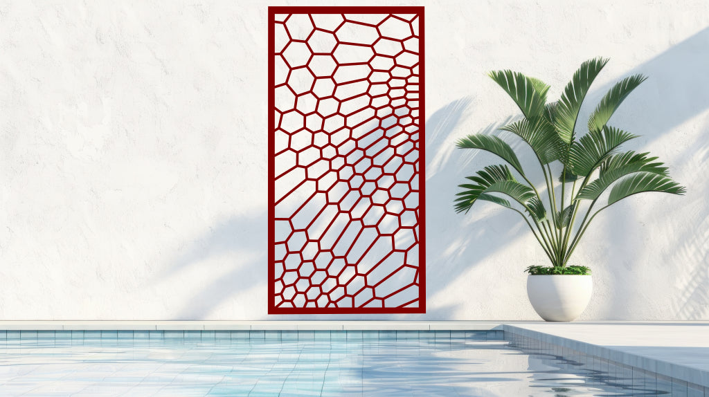 Striking red honeycomb-style privacy screen coated in Manor Red, delivering boldness and privacy to any outdoor area