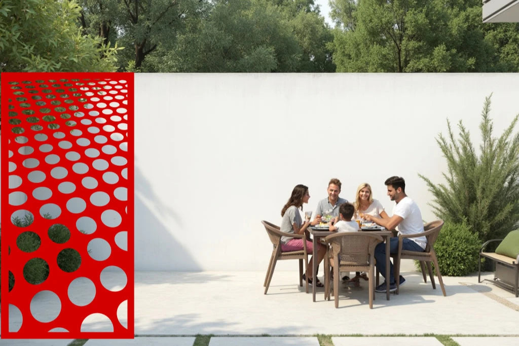 Vibrant metal privacy screen featuring circular patterns, coated in Signal Red, perfect for adding energy and privacy to outdoor areas