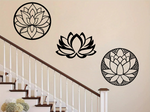 A three-piece metal wall art set featuring lotus flower designs, each uniquely crafted with geometric patterns and finished in Night Sky Matt Black powder coating. The set is mounted on a staircase wall, adding an elegant and serene touch to a classic interior space.