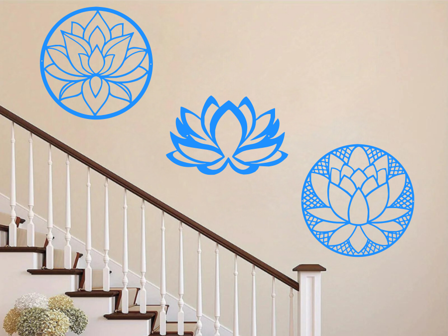 A three-piece metal wall art set featuring lotus flower designs, each uniquely crafted with geometric patterns and finished in Blaze Blue Gloss powder coating. The set is mounted on a staircase wall, adding an elegant and serene touch to a classic interior space.