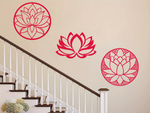 A three-piece metal wall art set featuring lotus flower designs, each uniquely crafted with geometric patterns and finished in Signal Red powder coating. The set is mounted on a staircase wall, adding an elegant and serene touch to a classic interior space.