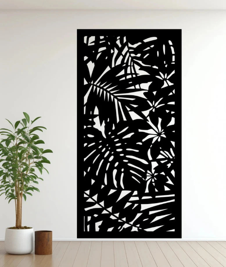 Metal privacy screen titled 'Nature,' featuring a detailed cutout of abstract botanical elements, finished in Night Sky Matt Black powder coating. The screen is mounted on an indoor white wall, adding a bold and sophisticated touch to the modern space