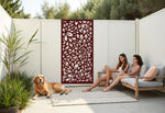 Oasis Dream privacy screen in Rust Patina, with a weathered floral pattern that blends seamlessly into rustic or natural outdoor settings, offering both privacy and a unique aesthetic for patios and gardens.