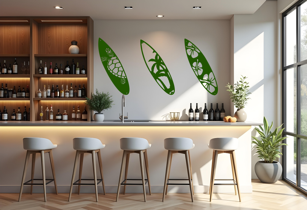 Metal wall art set featuring three surfboards with tropical and marine-themed cutouts, including a turtle, palm trees, and hibiscus flowers, finished in Mistletoe powder coating, mounted on a light wall in a modern home bar, adding a coastal and relaxed atmosphere.