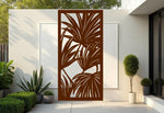 Oasis Veil privacy screen in Rust Patina, featuring weathered palm leaf designs that seamlessly blend into rustic and natural outdoor settings, providing a balance of privacy and style.